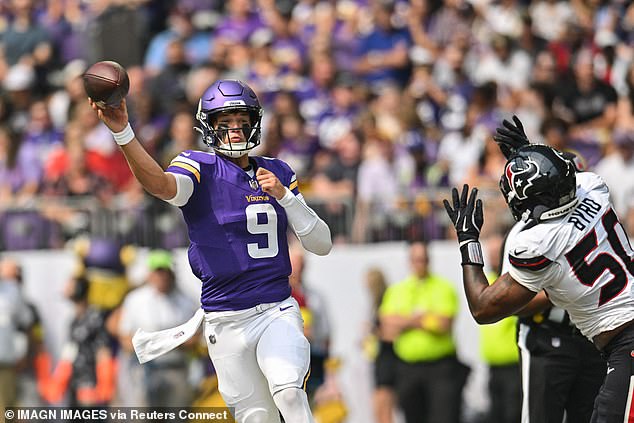 Vikings Qb Jj Mccarthy Throws A Pass Over Houston Texans Defensive End Solomon Byrd