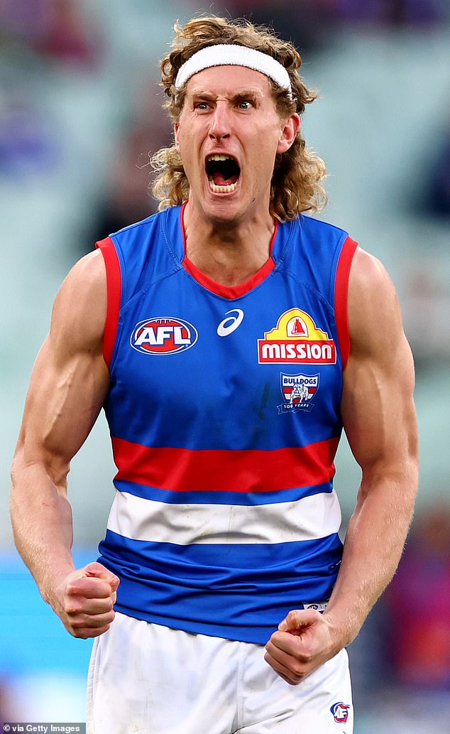 According To Austadiums, Afl Crowds Have Broken Through The Seven Million Mark In 2025 At An Average Of 37,000 Spectators Per Game, Compared To Nrl's 20,000 (Pictured, Western Bulldogs Star Aaron Naughton)