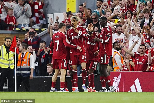 Liverpool Kicked Off Their Defence Of The Title With A 4-2 Victory At Home To Bournemouth