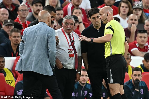 Referee Anthony Taylor (Right) Speaks With The Liverpool And Bournemouth Coaches And The Stadium Safety Officer After The Racist Incident
