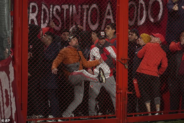 Home Fans Were Seen Attempting To Kick Open A Gate At The Libertadores De America Stadium