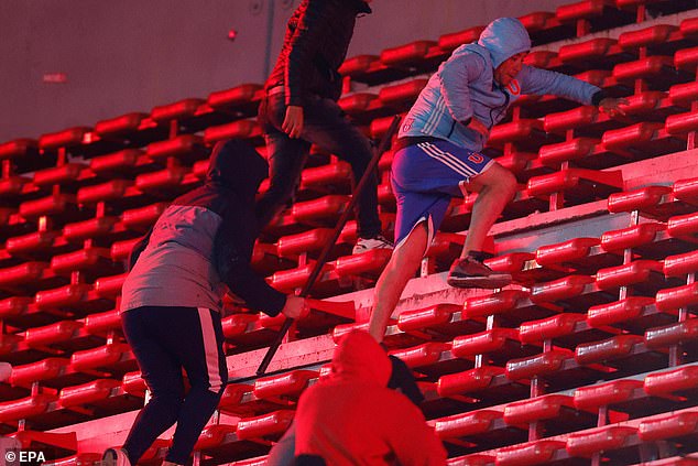 Clashes Between Supporters Escalated In The Second Half, With Visiting Fans Stripped And Beaten By Fans Carrying Metal Bars