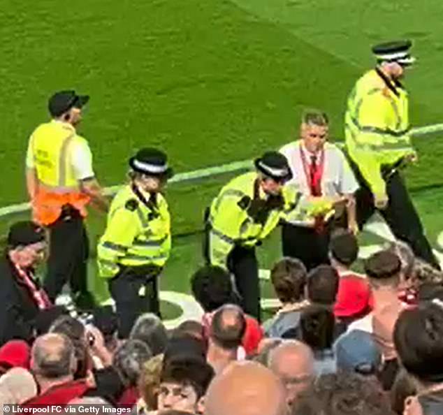 Police Are Seen Speaking To The Spectator Later In The Match Before He Was Removed