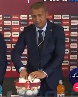 Romanian Football Federation official Gabriel Bodescu was seen moving a ball in an overcrowded bowl,