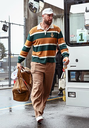 Travis Kelce Donned An Orange Outfit That Fans Are Convinced Was A Nod To Taylor Swift
