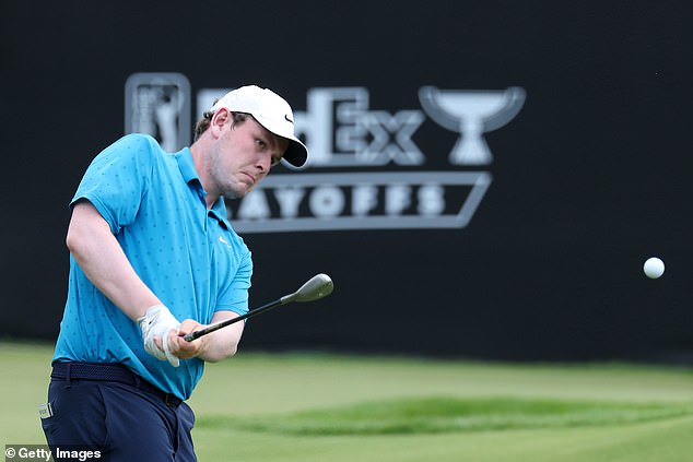 MacIntyre chips a beauty on to the 18th green to set up a tap-in birdie to seal his 64