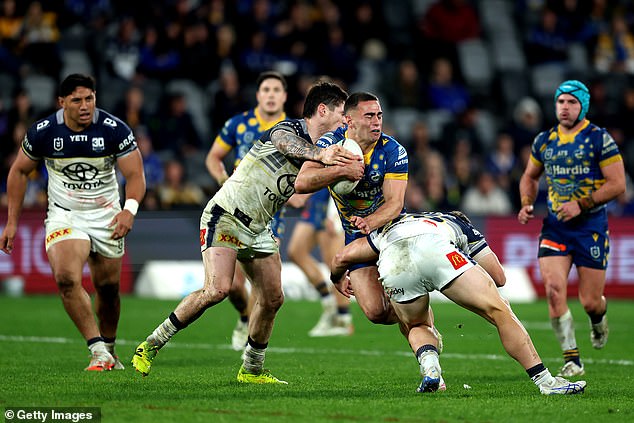 Mitch Moses Was Caught On Camera Delivering An On-Field Spray To His New Teammate Tallyn Da Silva In The Eels' Win Over The Cowboys (Pictured Running The Ball During The Match)