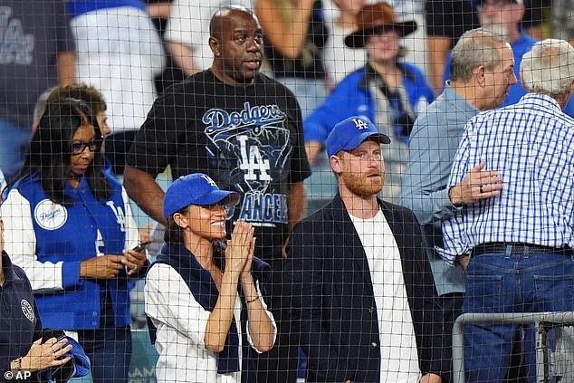 Johnson Looks Out At Dodger Stadium From His Seat Behind Harry And Meghan On Tuesday