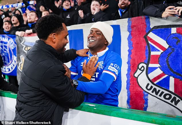 Danilo Embraces His Father, Marcelo Silva, After The Victory Over Hibs On Wednesday Night