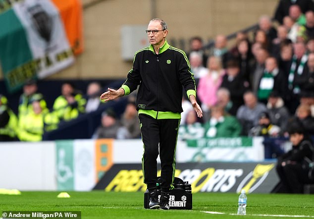 Decked Out In A Retro Adidas Tracksuit With Lime Green Trim, The Northern Irishman Stood On The Hampden Touchline Looking Like He Could Easily Have Been Due On Centre Court To Face Bjorn Borg