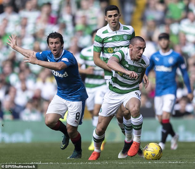 Barton Gets The Runaround From Brown During The 5-1 Win For Celtic