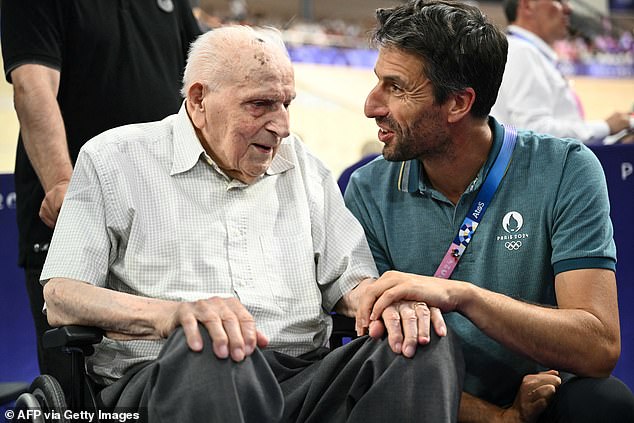 Paris 2024 Olympics And Paralympics Organizing Committee (Cojo) Chairman Tony Estanguet (R) Speaks With French Former Cyclist Charles Coste At The 2024 Olympic Games