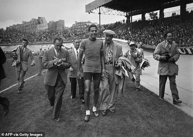 French Cyclist Charles Coste Surrounded By Journalists And Press Photographers In 1949