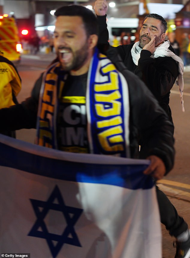 Israeli Fans Showing Their Support By Waving Flags On The Streets. The Two Groups Defied A Police Ring Of Steel