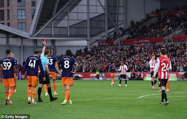 Dan Burn Was Shown The Red Card By Referee Stuart Atwell After A Challenge On Dango Ouattara