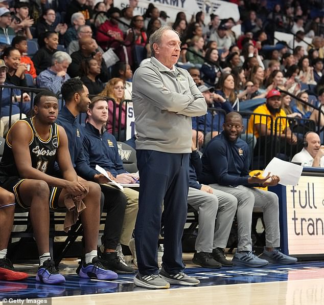 At La Salle, For A $2,500 Donation, Fans Can Sit Next To Coach Fran Dunphy (C) And His Players