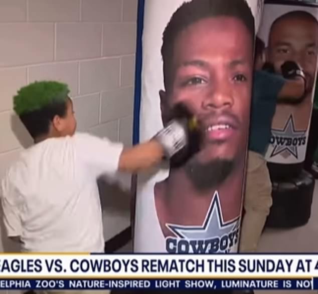 A group of Eagles-supporting school kids attacked punchbags dressed as Cowboys players