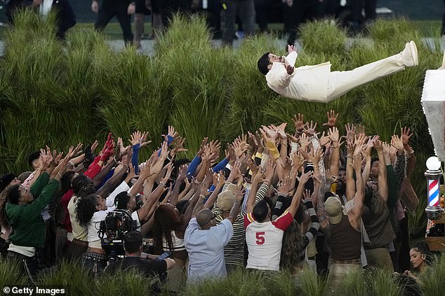 At One Point He Fell Back From The Stage And Was Caught By Dancers On The Ground Below