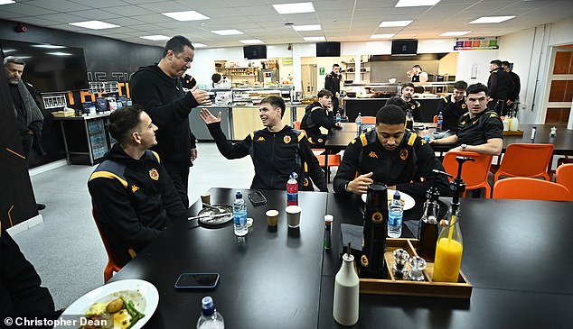 At The Club's Training Ground Ilicali Strides Into The Team Restaurant With A Jocular Conversation With The Players