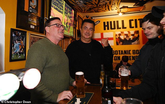Ilicali Mingles With Supporters But There's No Fanfare About His Arrival. He Drinks A Coke At The Bar With The Landlord