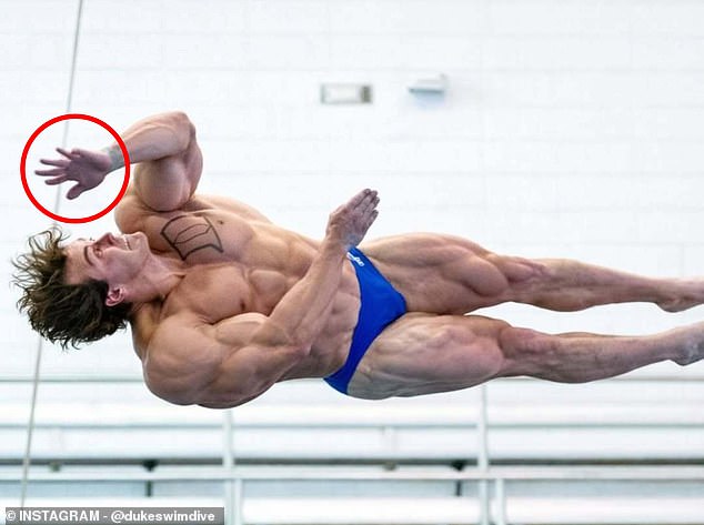 But With The Badly Drawn Tattoos And The Six Fingers On This Athlete's Left Hand, It's Clear Ai