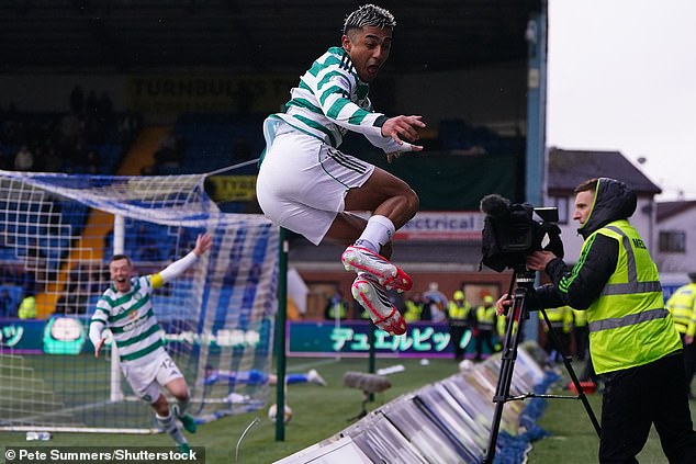 The Mexican International Leaps Over The Advertising Boards Into The Away End At Rugby Park