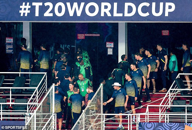 The Moment Australia Was Knocked Out Of The T20 World Cup As Ireland And Zimbabwe Players Shake Hands After Their Game Was Washed Out