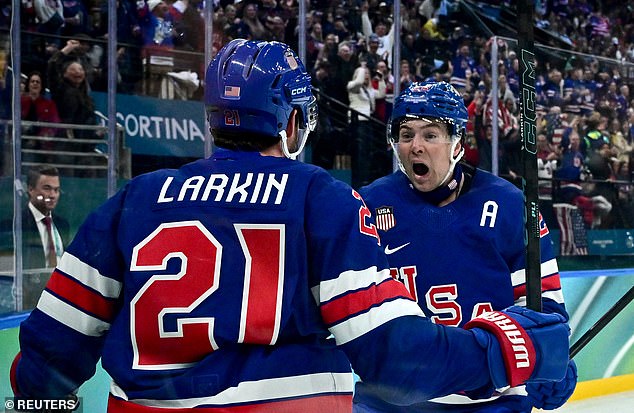 Dylan Larkin And Charlie Mcavoy Celebrate Their Second-Period Goal Against Sweden