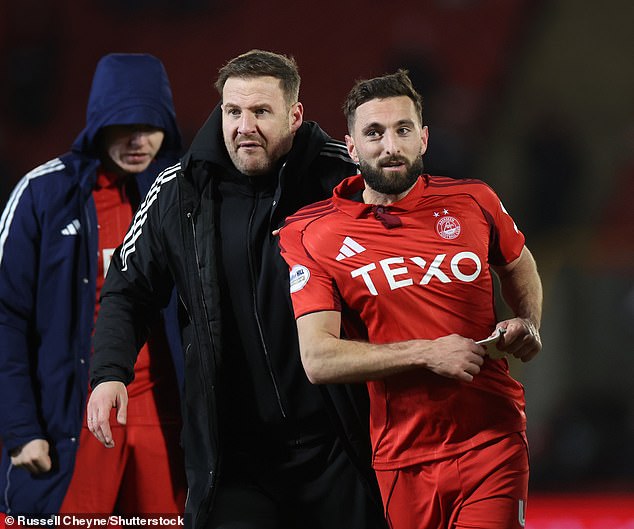 Dons Caretaker Boss Peter Leven Celebrates With Shinnie, Who Scored The Dons' Second