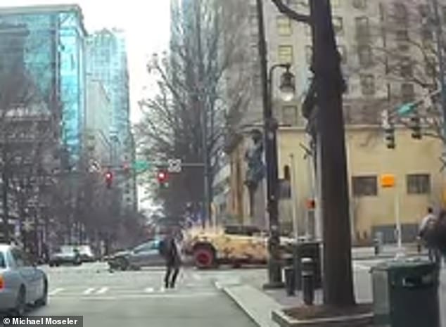 Ball's Hummer Continued Traveling Down The Street After The Collision Despite Losing A Wheel