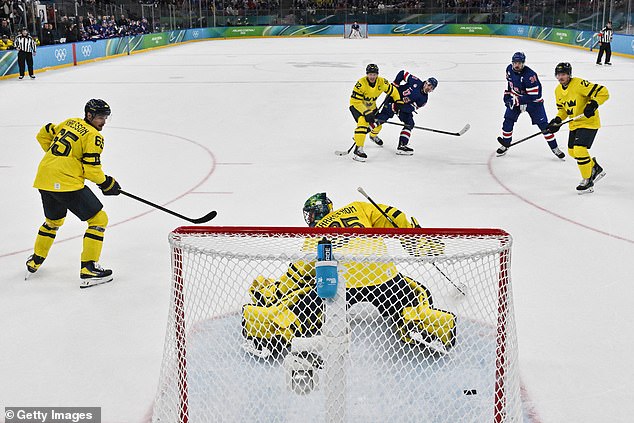 Hughes' (Blue, Center) Goal In Overtime Gave The Americans A Shaky Win Over Sweden