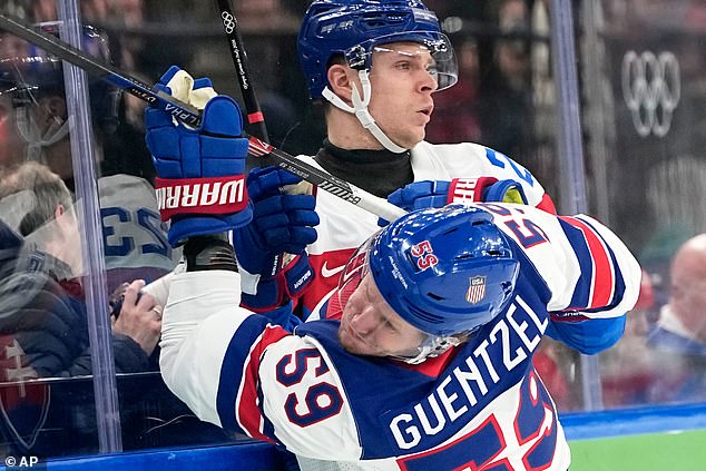 Slovakia's Adam Liska (23) Challenges With United States' Jake Guentzel (59) On Friday