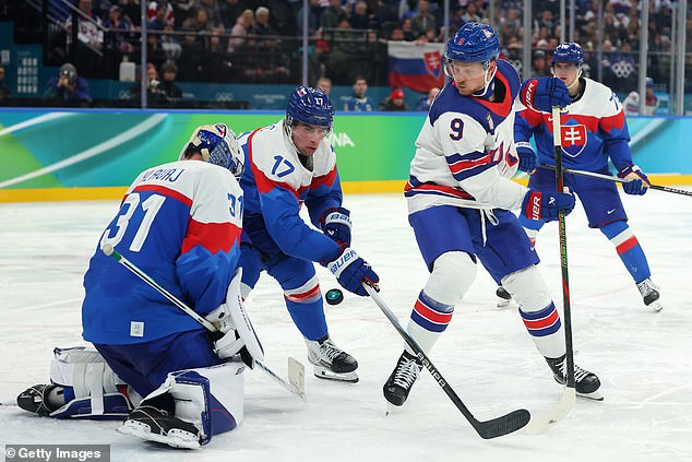 Jack Eichel Watches For A Rebound Against Samuel Hlavaj Of Team Slovakia In The Second