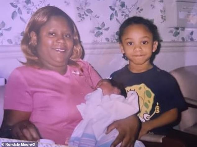 A Young Rondale Moore Is Pictured Alongside His Mother, Quincy Ricketts, In This Photo