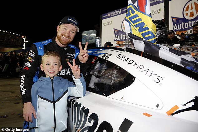 Reddick And His Six-Year-Old Son Beau Smile For The Cameras After His Victory In Georgia