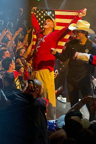 He Also Held The American Flag Aloft