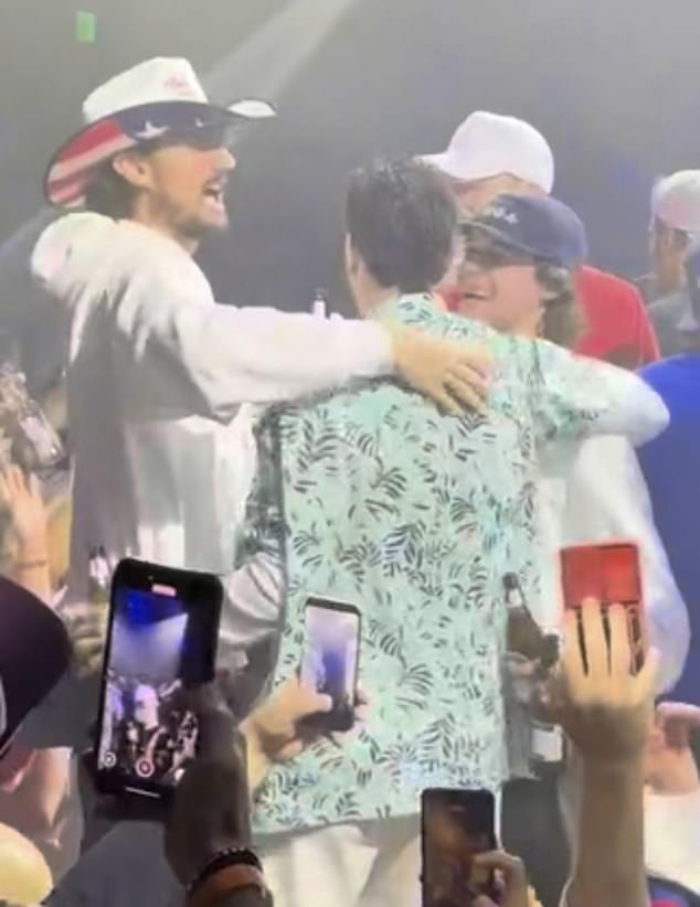 Heroic Goaltender Connor Hellebuyck (L), Seen On Stage Wearing A Cowboy Hat On Monday