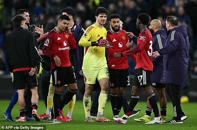 Lammens Receives The Adulation Of His Team-Mates At The Full-Time Whistle On Monday Night