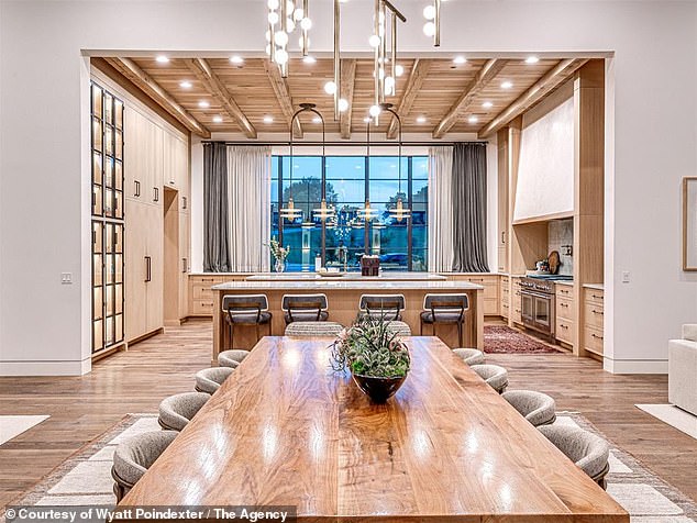 The Main Kitchen, Living Room And Hallways Are All Filled With Custom Furnishings