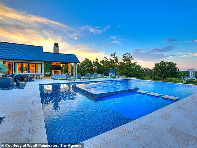 The Property Also Includes A Two-Level Swimming Pool Featuring A Waterfall
