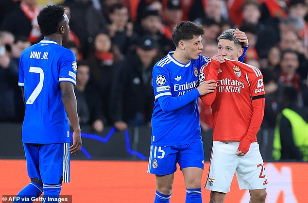 The Now Infamous Moment Where Gianluca Prestianni Says Something To Vinicius Jnr (Left) From Behind His Shirt, Which The Brazilian Insists Was Racist In Nature