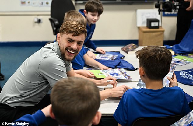 When His Identity Is Revealed, There Is Classroom Bedlam. Dewsbury-Hall Makes His Way From Table To Table Talking About Books, Reading And A Fair Bit Of Football