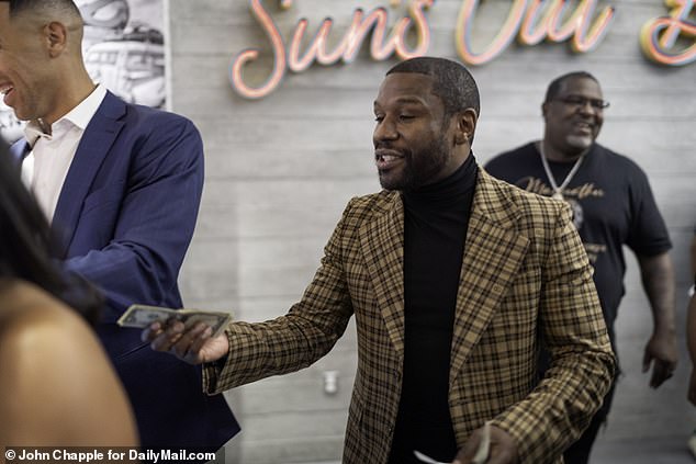 Pulling Out A Thick Wad Of Cash, He Went To Pay Before Pausing Dramatically, Spreading The Bills Across His Hands And Playfully Quipping 'I've Got The Money, I Just Don't Want To Spend It!'