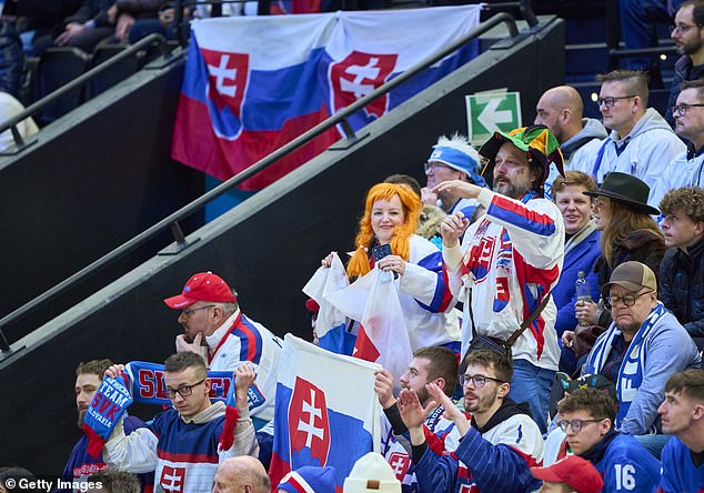 Slovakian Fans Celebrate While Watching Their Team Win The Opening Game At The Olympics