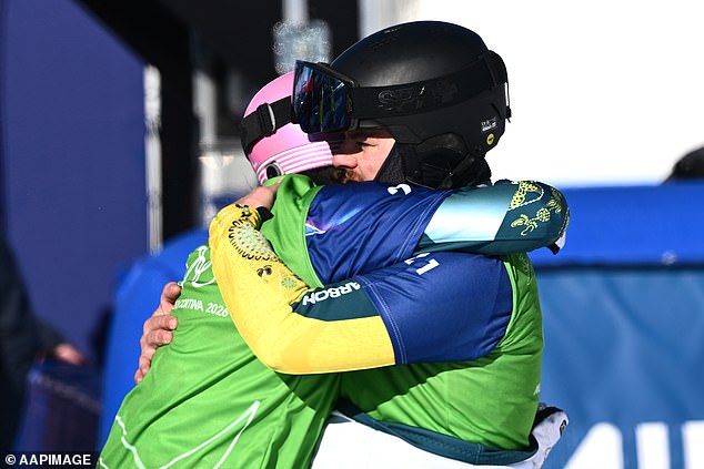 Josie Baff Hugs Australian Teammate Adam Lambert After He Crashed Out In The Snowboard Cross