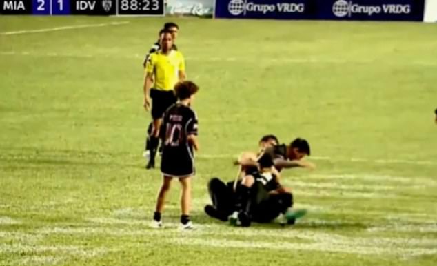 Lionel Messi Was Hauled To The Ground By A Security Guard Who Tried To Grab A Crazed Fan