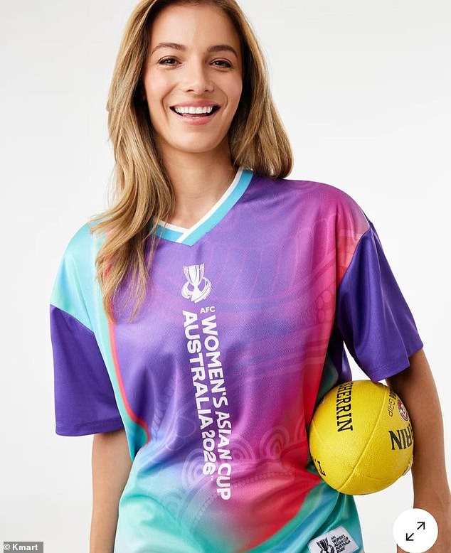 Aussie Retailer Kmart Has Been Roasted Online Following A Huge Clanger Involving The Matildas Ahead Of The Asian Cup (Pictured, A Model In Matildas Gear While Holding An Afl Sherrin Footy)