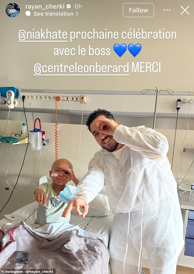 Manchester City's Rayan Cherki (Right) Visited A Young Fan (Left) In Hospital This Week