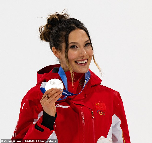 Eileen Gu Poses With Her Silver Medal In Italy, The Fifth Medal Of Her Career At Winter Olympics