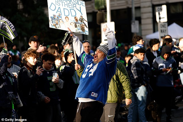 One Seattle Seahawks Fan Enjoys A Large Can Of Monster Energy Before Wednesday's Parade